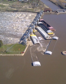 Seven barges broke free at the Marseilles Dam.
