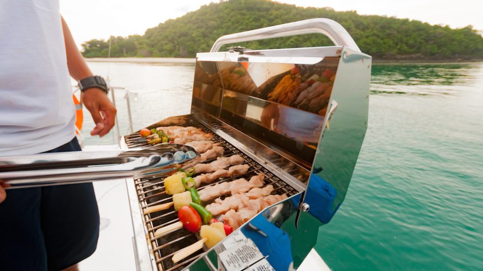 Barbecue preparing for a party on the luxury catamaran yacht
